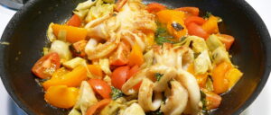 Read more about the article Calamari con pomodori freschi
